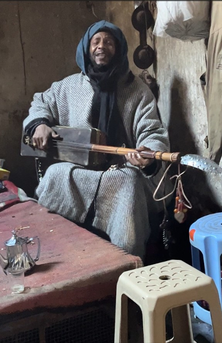 Mr. Soudani plays the guinbri at the hammam furnaces